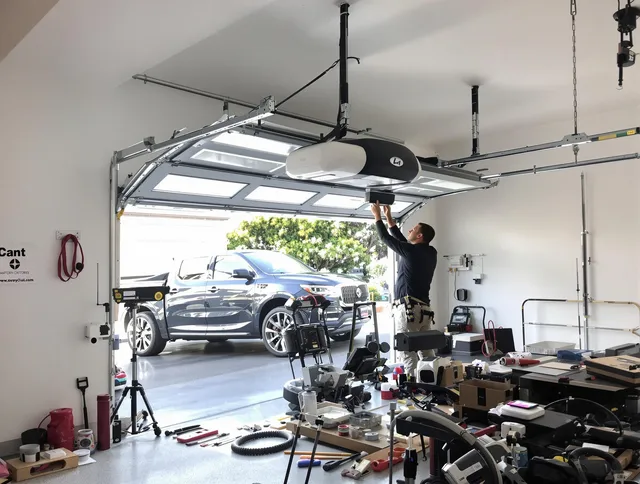 East Cleveland Garage Door Repair specialist installing smart garage door opener system in East Cleveland home
