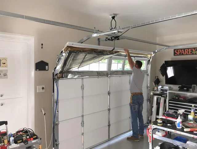 Garage door section replacement by East Cleveland Garage Door Repair in East Cleveland