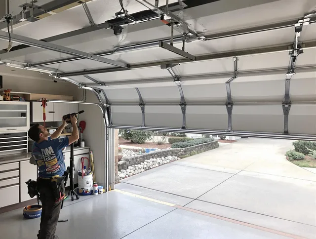 Garage door track repair service by East Cleveland Garage Door Repair in East Cleveland